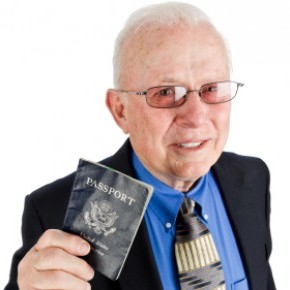 senior traveller with his passport